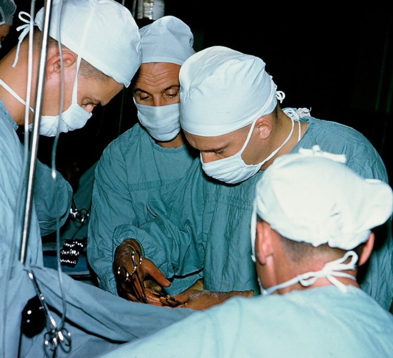 Robert Pontius, MD and team of medical professionals in surgery