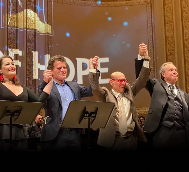 Robert S. Cohen takes a bow with others following a group performance at Carnegie Hall.
