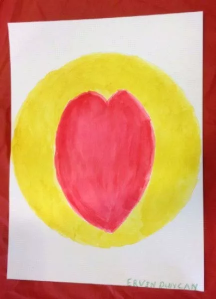 Red heart painted in yellow circle. Credit: Daniel Potts