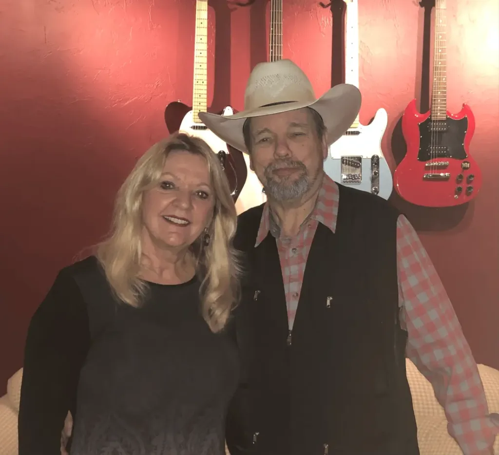 Catherine Marie and Wayne Broze, Texas Country Music Hall of Fame inductee, on the set of I’m Still Here.