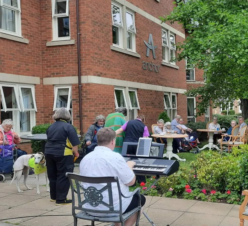 Richard Ellis plays the keyboard as part of a Bringing Harmony to Dementia Care: Richard’s Rhythmic Remedy Nation event.