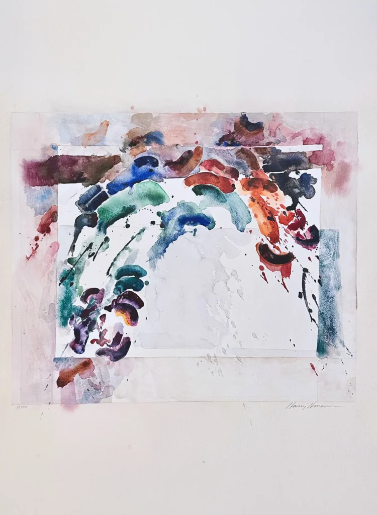 A piece of artwork hangs on a wall, with vivid colors and movement in an abstract arc.