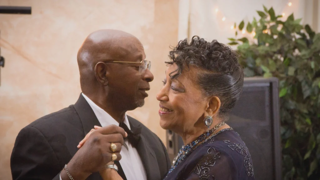 A man and a woman dance together