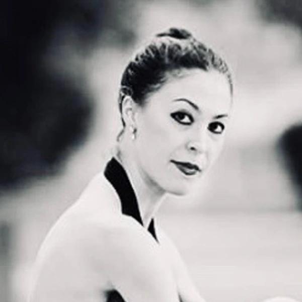 black and white image of a woman in a ballet outfit