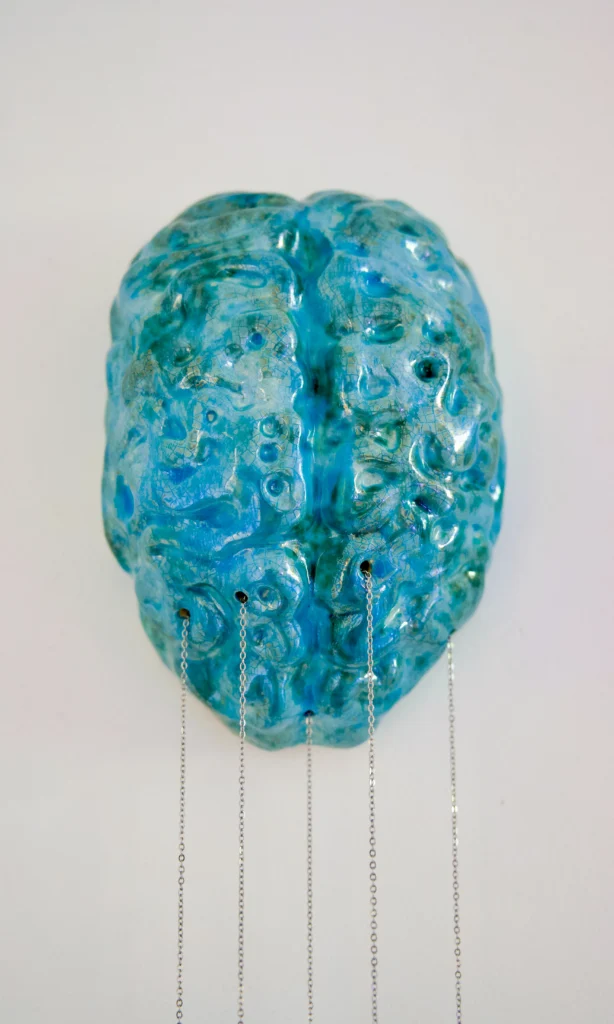 Closeup of the teal ceramic brain