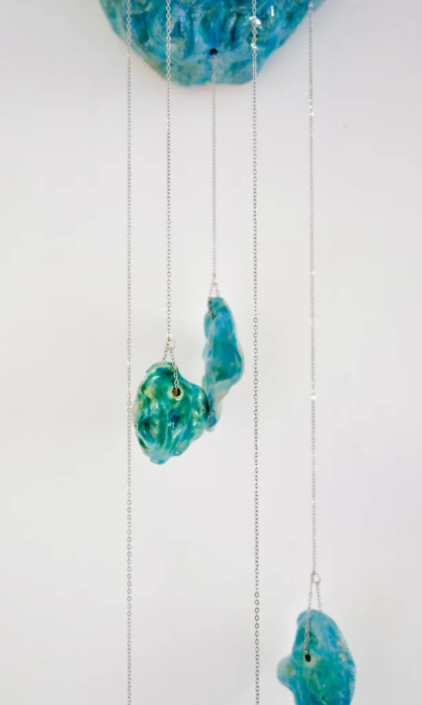 Closeup of the ceramic brain matter hanging from the main brain